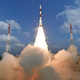 An ISRO Polar Satellite Launch Vehicle lifting off from a launch pad at the Satish Dhawan Space Centre in Sriharikota, India.